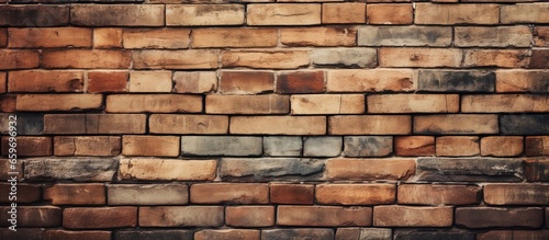 Texture background of a brown brick wall