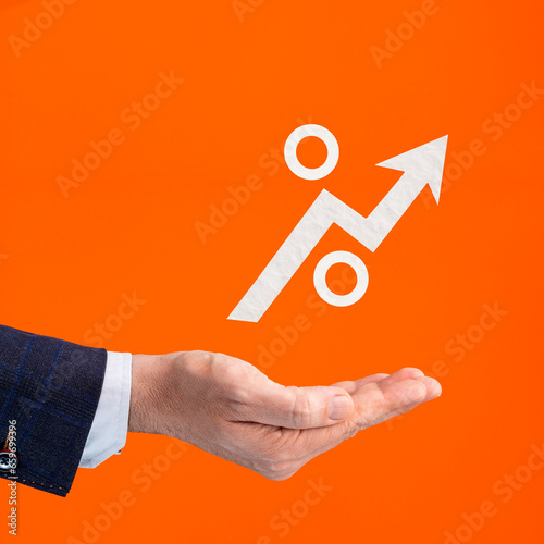 Businessman hand holding increasing percentage icon - Business concept