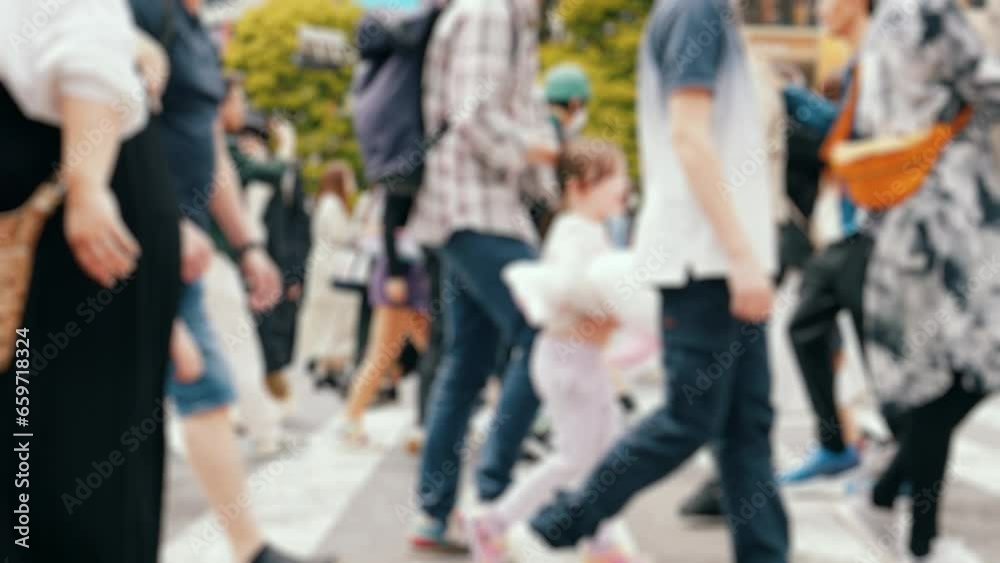 Many pedestrians crossing on the road, Shibuya in Tokyo in Japan, Slow motion Many pedestrians crossing on the road, Shibuya in Tokyo in Japan, Slow motion
