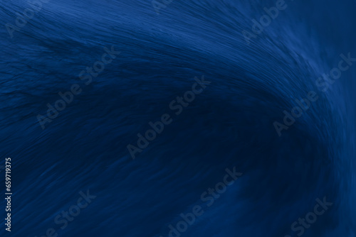暗い深海の底へと大きなうねりとなって沈み込むような重く暗い群青色のイメージ