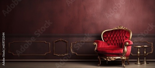 Old fashioned design red velvet and gold armchair in living room