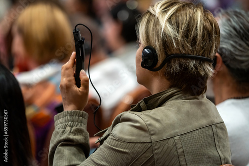 Photography a set of headphones for simultaneous translation during negotiations in foreign languages