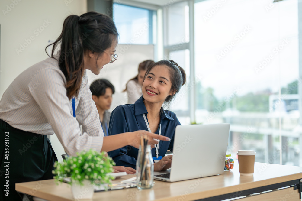 Professional office worker discussing and analyzing the project together in the office room. Professional office worker discussing and analyzing the project together in the office room.