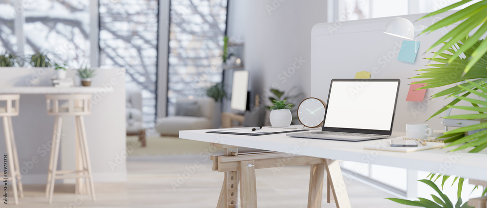 Close-up image of mock up laptop on a table in a modern minimal living room. Close-up image of mock up laptop on a table in a modern minimal living room.