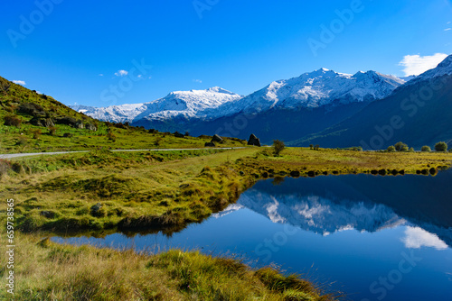 Snow mountains and reflection on lake in South Island  New Zealand