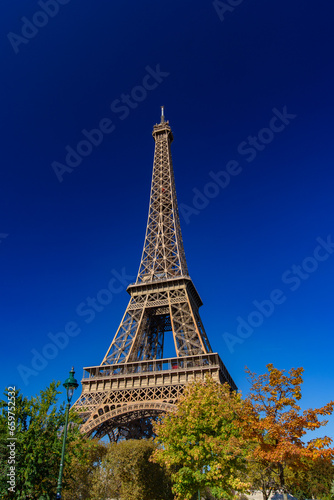 Eiffel Tower with sunny blue sky in Paris  France