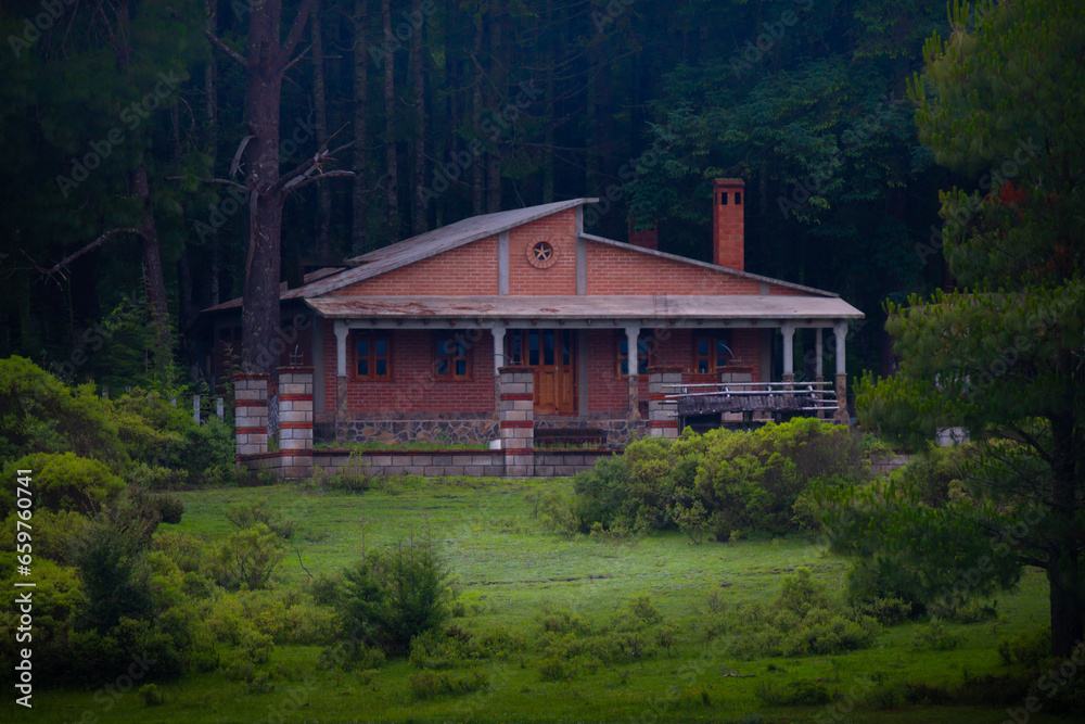 Peaceful cabin in the woods. Green spring. Cold. Lonelyness. Peaceful cabin in the woods. Green spring. Cold. Lonelyness.