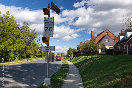 Cuadro en lienzo Quiet suburban street in Frederick, MD, with two-story houses, green lawns, and