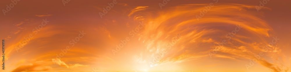 Glowing golden red sunset sky panorama. HDR 360 seamless spherical panorama. Full zenith or sky dome for 3D visualization, sky replacement for aerial drone panoramas. Nature weather and climate change