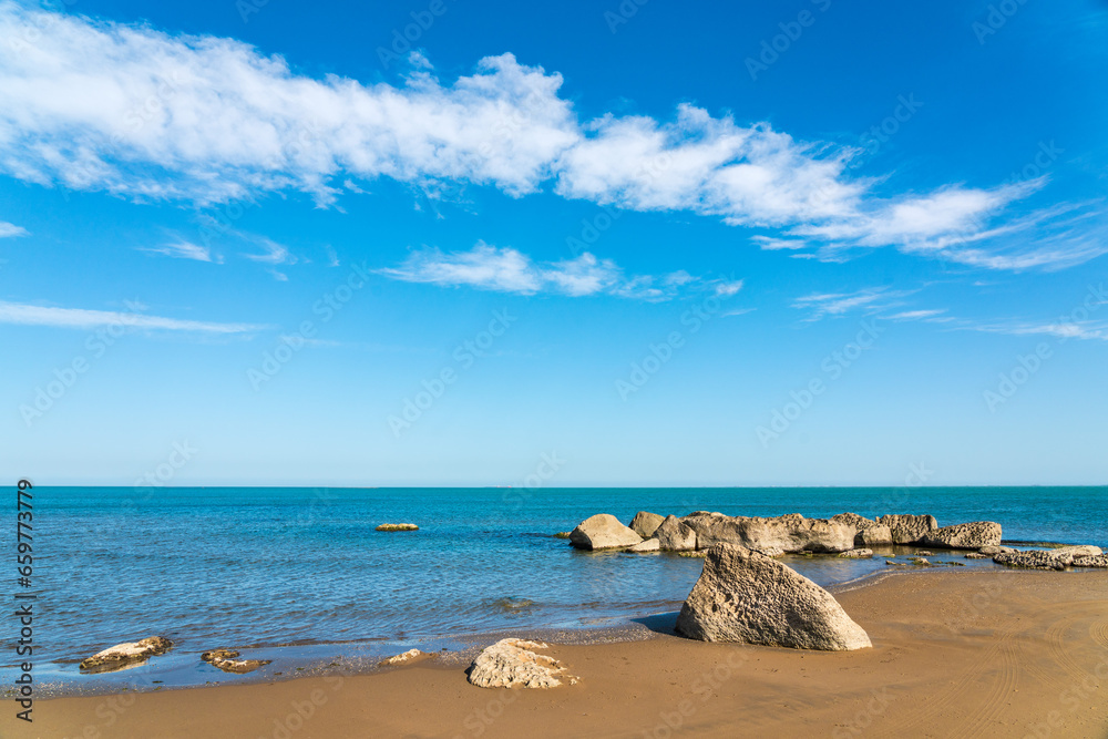 Beautiful blue sea and empty rocky beach