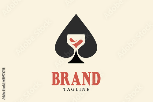 The iconic logo of Spades and a glass of Wine