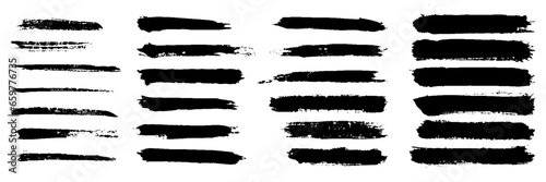 big set of thin black grunge strokes. vector photo