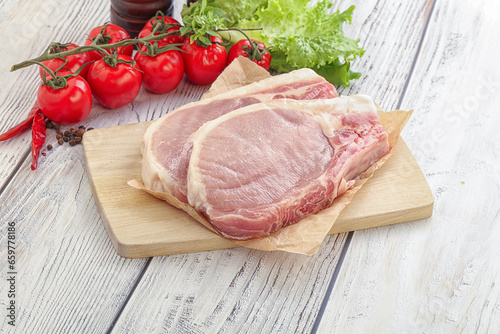 Raw pork t-bone steak for grill