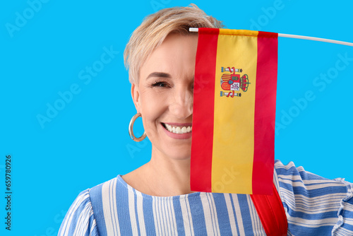 Happy mature woman with fla...