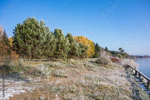The first frosts and silence of an autumn morning on the Irkutsk reservoir on the eve of winter.