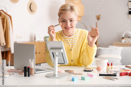 Female beauty blogger with ...