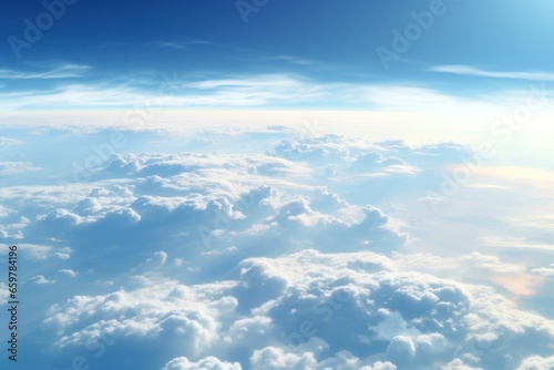 A captivating view of the sky and clouds as seen from the window of an airplane. Perfect for travel and aviation-related projects