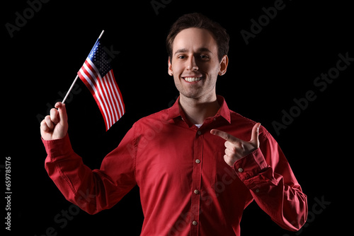 Young man pointing at USA f...