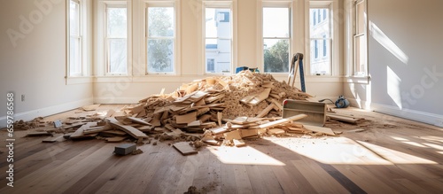 Hardwood floor being removed from apartment construction