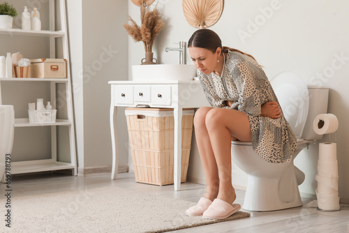 Young woman suffering from ...