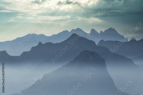 Fototapeta Naklejka Na Ścianę i Meble -  Dachstein mountains in the fog, Salzkammergut
