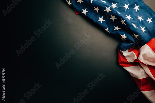 Vintage Veterans Day American flags on a blackboard backdrop. A symbol of honor, democracy, and the United States is.
