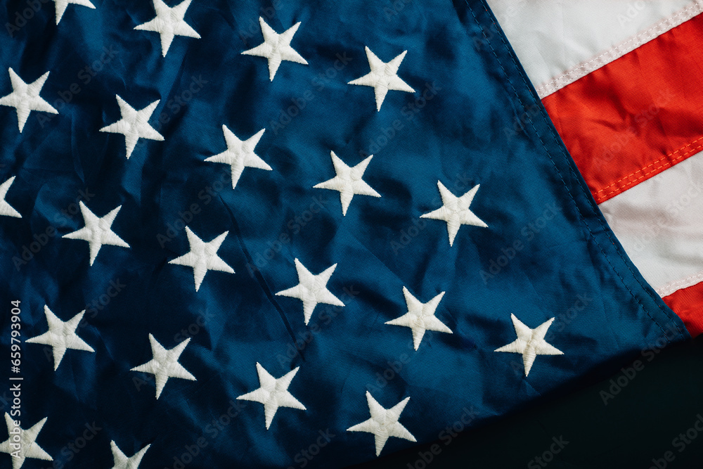 Fototapeta premium Vintage American flag on antique wooden platform - A patriotic tribute to veterans. Symbolic pride and honor in the United States is.