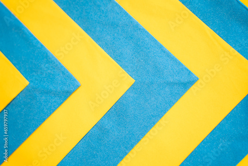 blue and yellow napkins laid out in a row