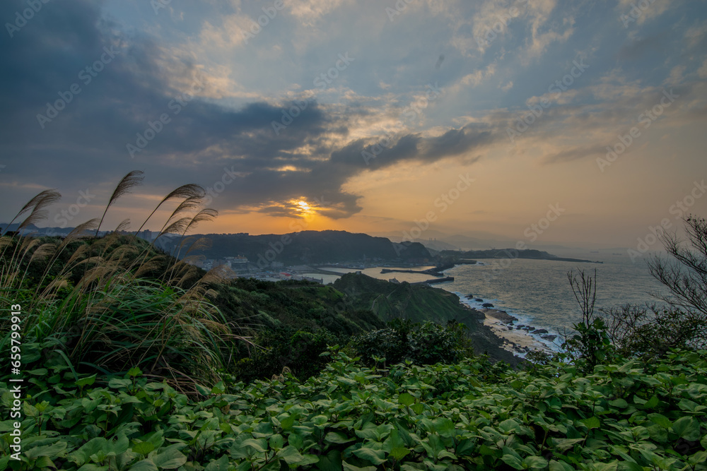 overlook of mountain and sea with sunset, in Keelung City, Taiwan.