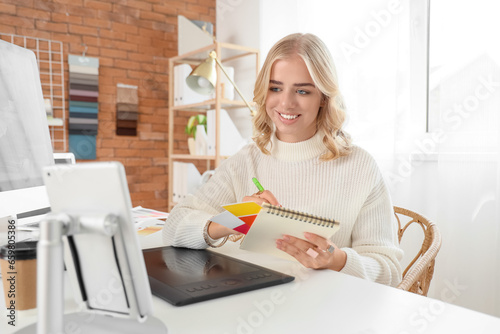 Young female interior desig...