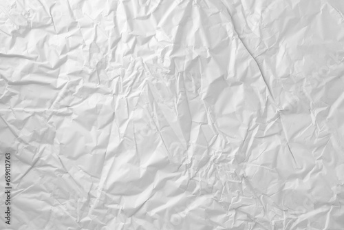 Blank white crumpled paper texture background. Creased paper poster texture.