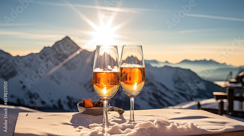 Winter Wonderland Toast: Apre Ski Champagne in the Majestic Mountain Scenery photo