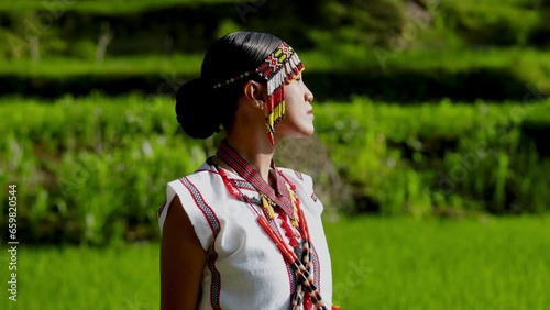 Lady In Traditional Attire Ambles Through Field