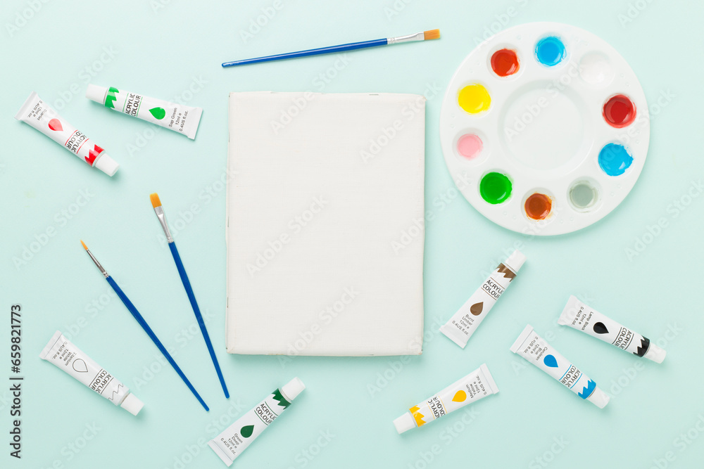 Painting tools on color background, top, view Painting tools on color background, top, view