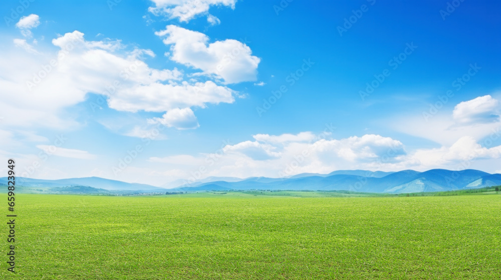 Green grass field on slope with blue sky and clouds background, cloud mountain tropic valley landscape, wide misty panorama Green grass field on slope with blue sky and clouds background, cloud mountain tropic valley landscape, wide misty panorama