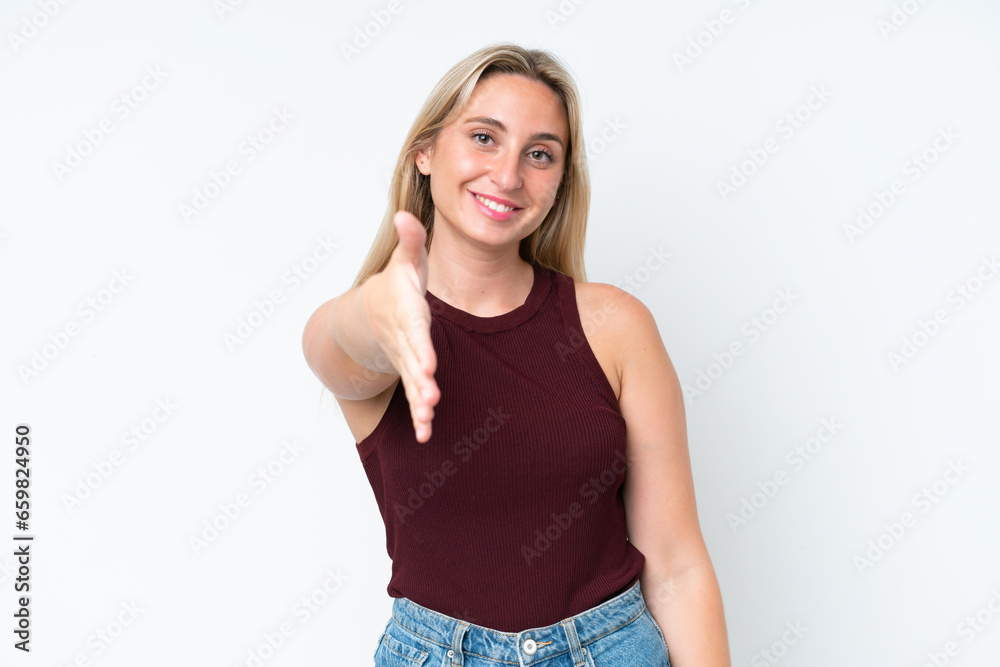 Young caucasian woman isolated on white background shaking hands for closing a good deal Young caucasian woman isolated on white background shaking hands for closing a good deal