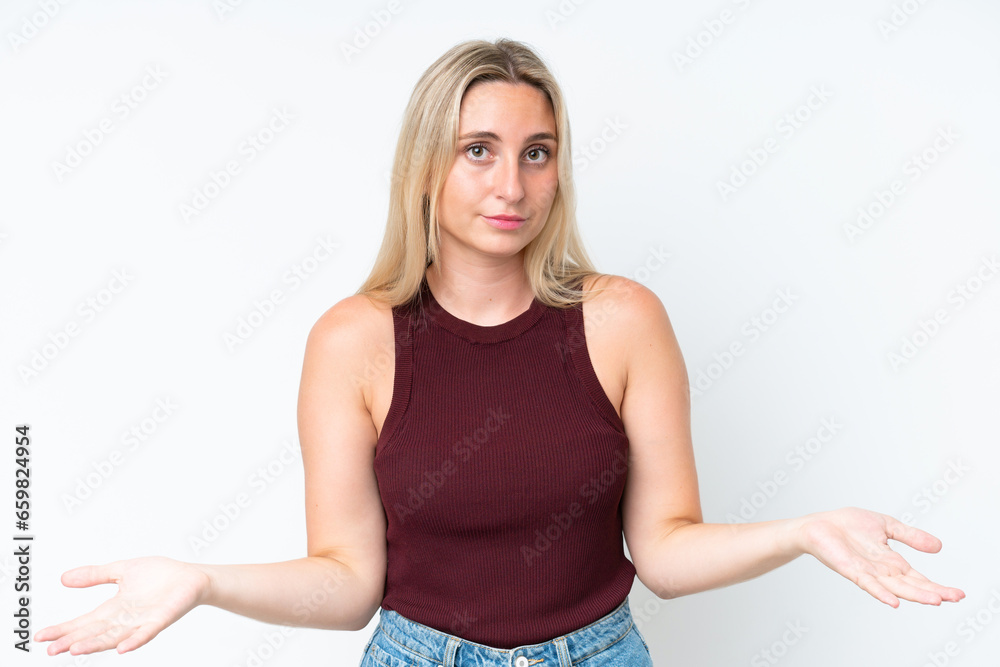 Young caucasian woman isolated on white background having doubts