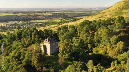 Aerial of medieval Castle Campbell above the town of Dollar, Clackmannanshire, Scotland photo