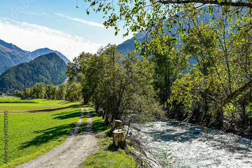 Längenfeld, Ötztaler Ache, Fluss, Uferweg, Ötztal, Wanderweg, Tal, Tirol, Berge, Wald, Landwirtschaft, Sölden, Herbst, Spätsommer, Österreich photo