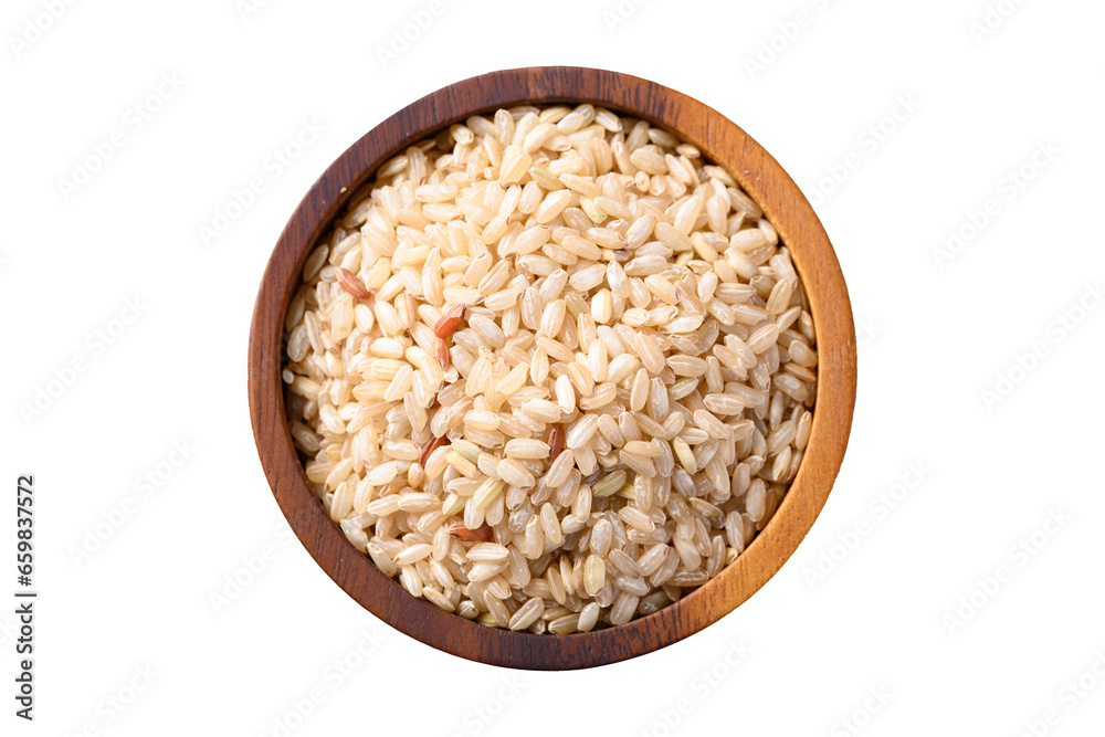 Organic Thai brown rice grain in wooden bowl Organic Thai brown rice grain in wooden bowl