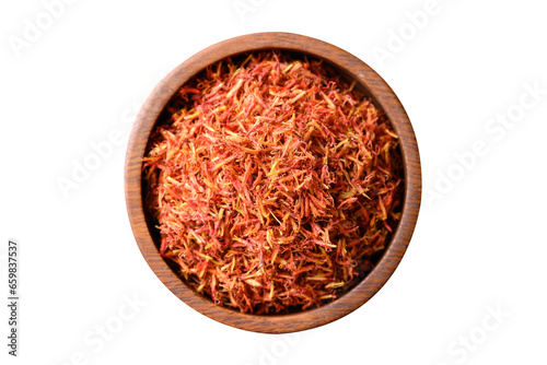 Dried safflower in wooden bowl, Top view