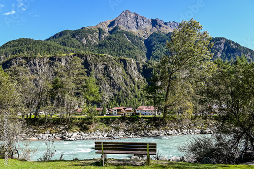 Längenfeld, Ötztaler Ache, Fluss, Uferweg, Ötztal, Wanderweg, Holzbank, Tal, Tirol, Berge, Wald, Landwirtschaft, Sölden, Herbst, Spätsommer, Österreich photo