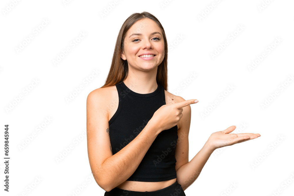 Young blonde woman over isolated chroma key background holding copyspace imaginary on the palm to insert an ad