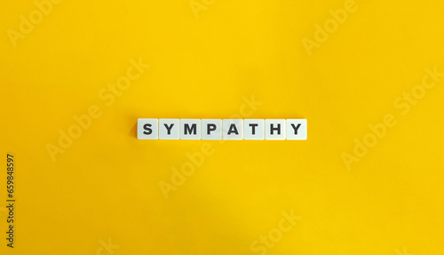 Sympathy (Feeling Towards Another) Word and Concept Image. Letter Tiles on Yellow Background. Minimal Aesthetic.