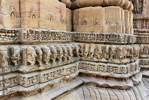 Carved elephants on walls, Sabha Mandap, Sun Temple, Modhera, Gujarat, India. photo
