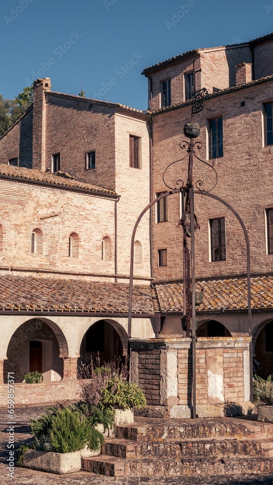 Fototapeta premium View of the cloister of ancient abbey in the Marche region, Italy