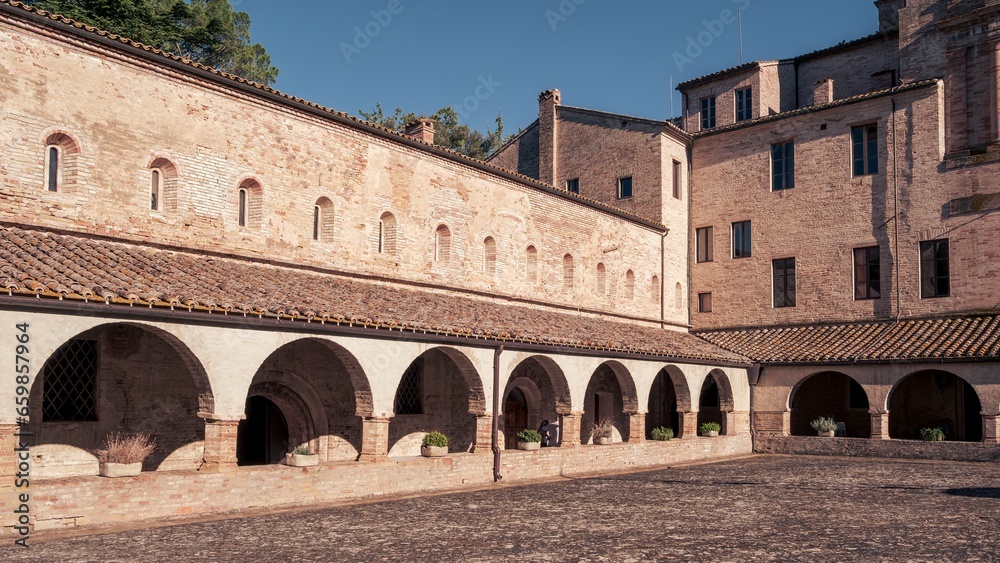 View of the cloister of ancient abbey in the Marche region, Italy
