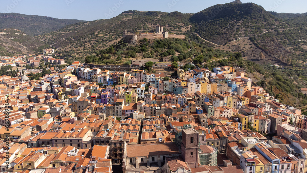 Aerial view of the colorful village of Bosa and its Malaspina castle on the island of Sardinia in Italy