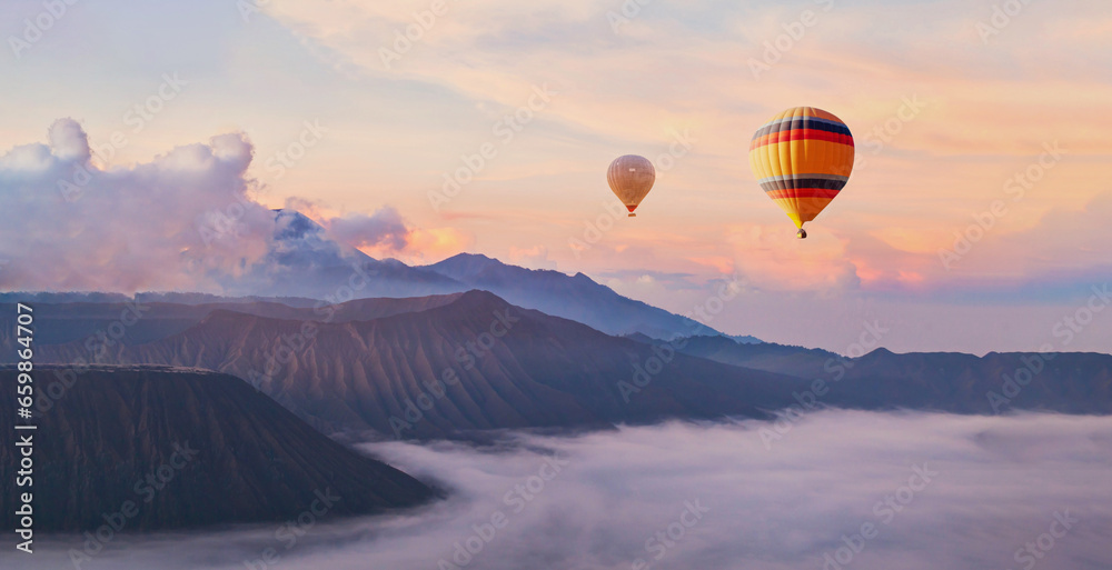 beautiful inspirational sunrise landscape with hot air balloons in sky, nature travel destination, scenic view banner background - obrazy, fototapety, plakaty 