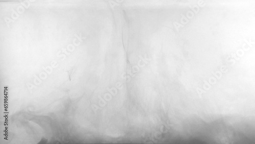 Black color dye melt in water on white background,Abstract smoke pattern,Colored liquid dye,Splash paint